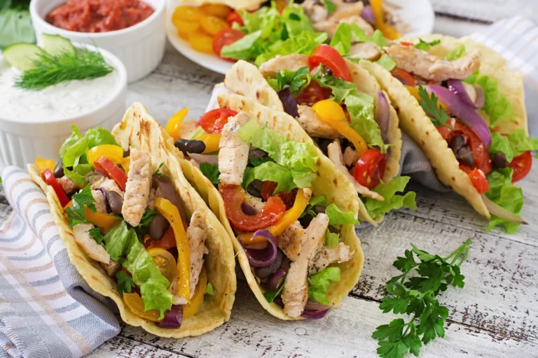 mexican-tacos-with-chicken-bell-peppers-black-beans-fresh-vegetables